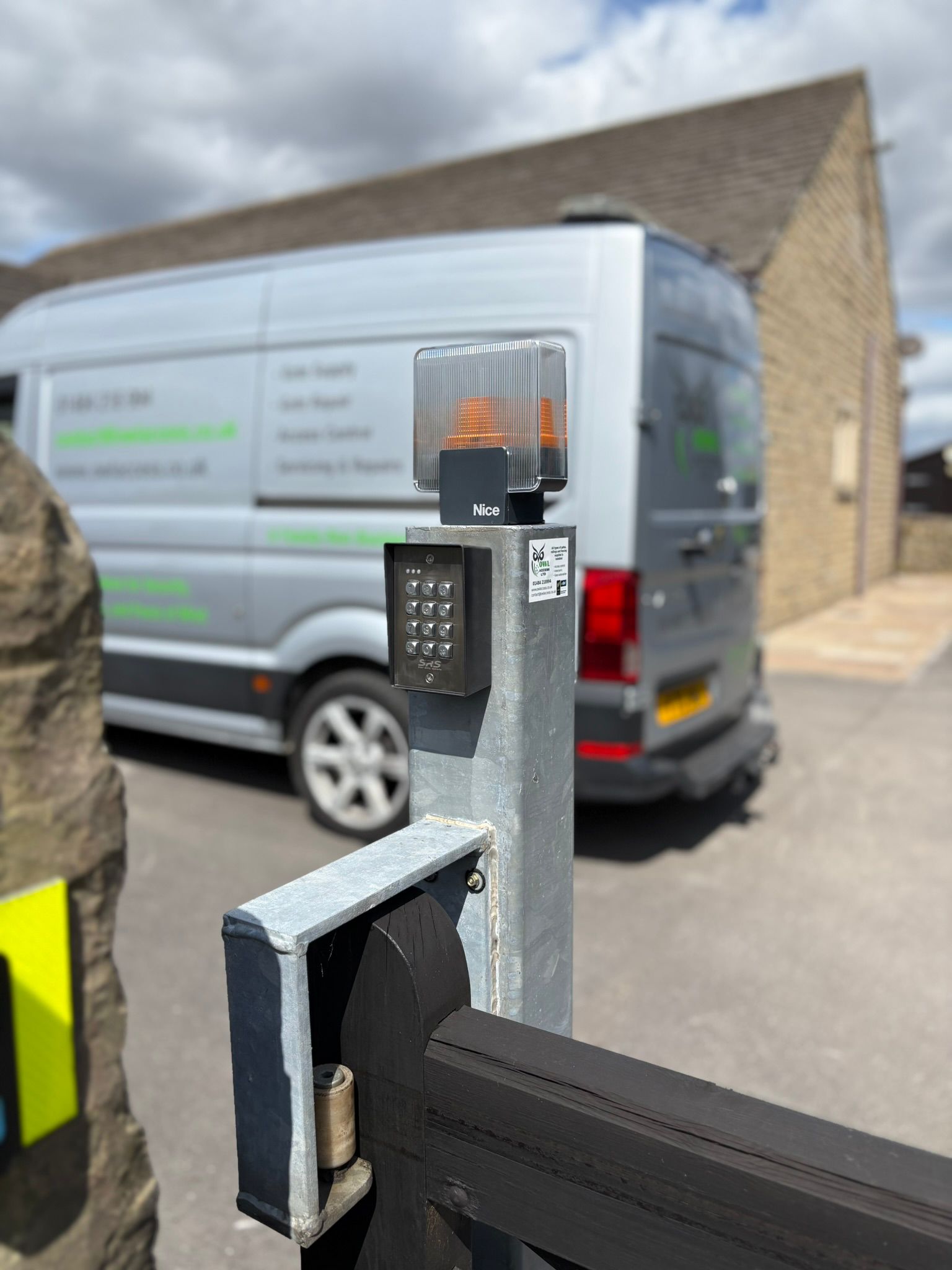 This image shows an SRS keypad, on a DEA automated gate system, and a Nice Strobe Light.