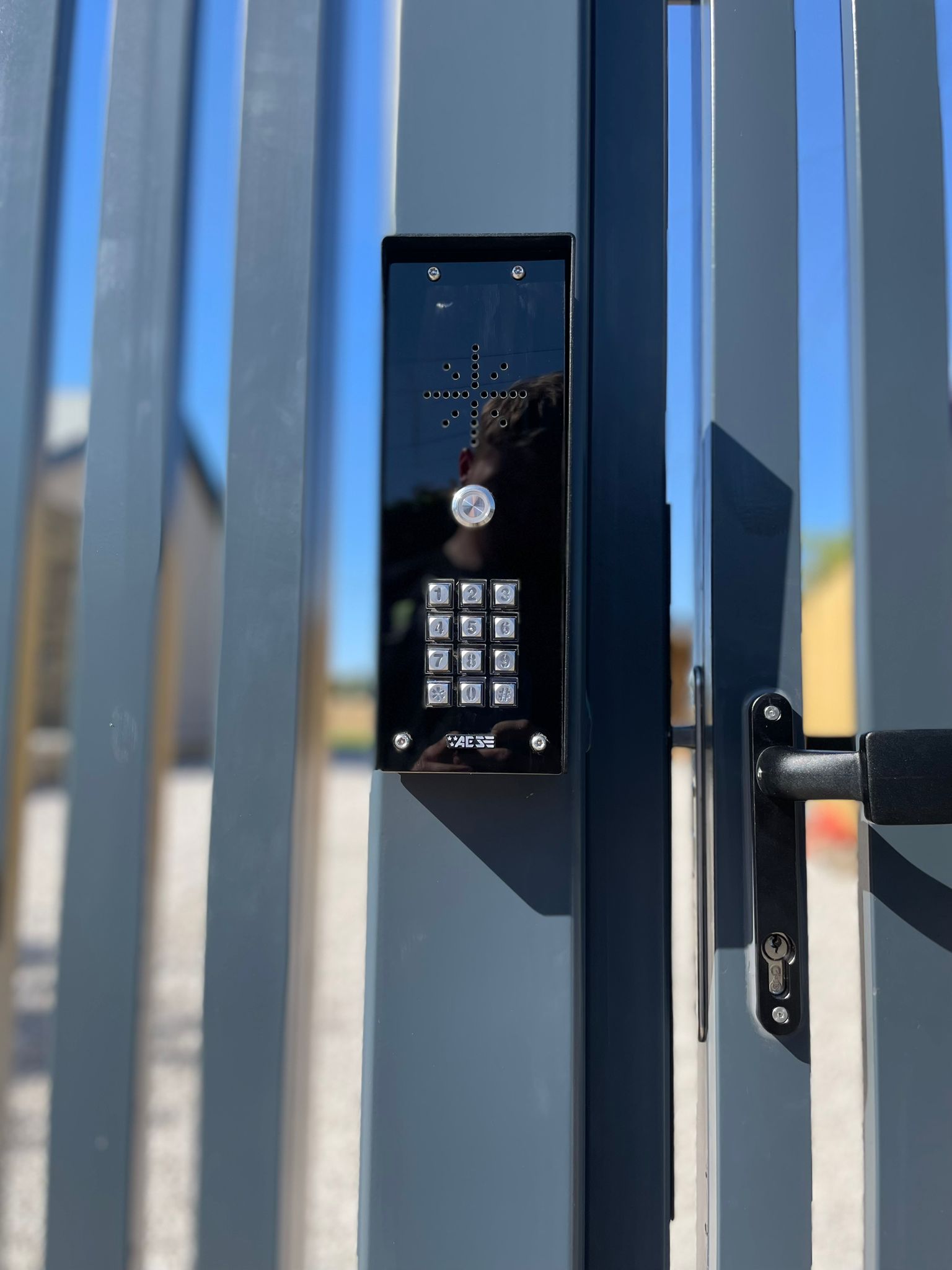 This image shows an AES GSM/4G Intercom with keypad.
