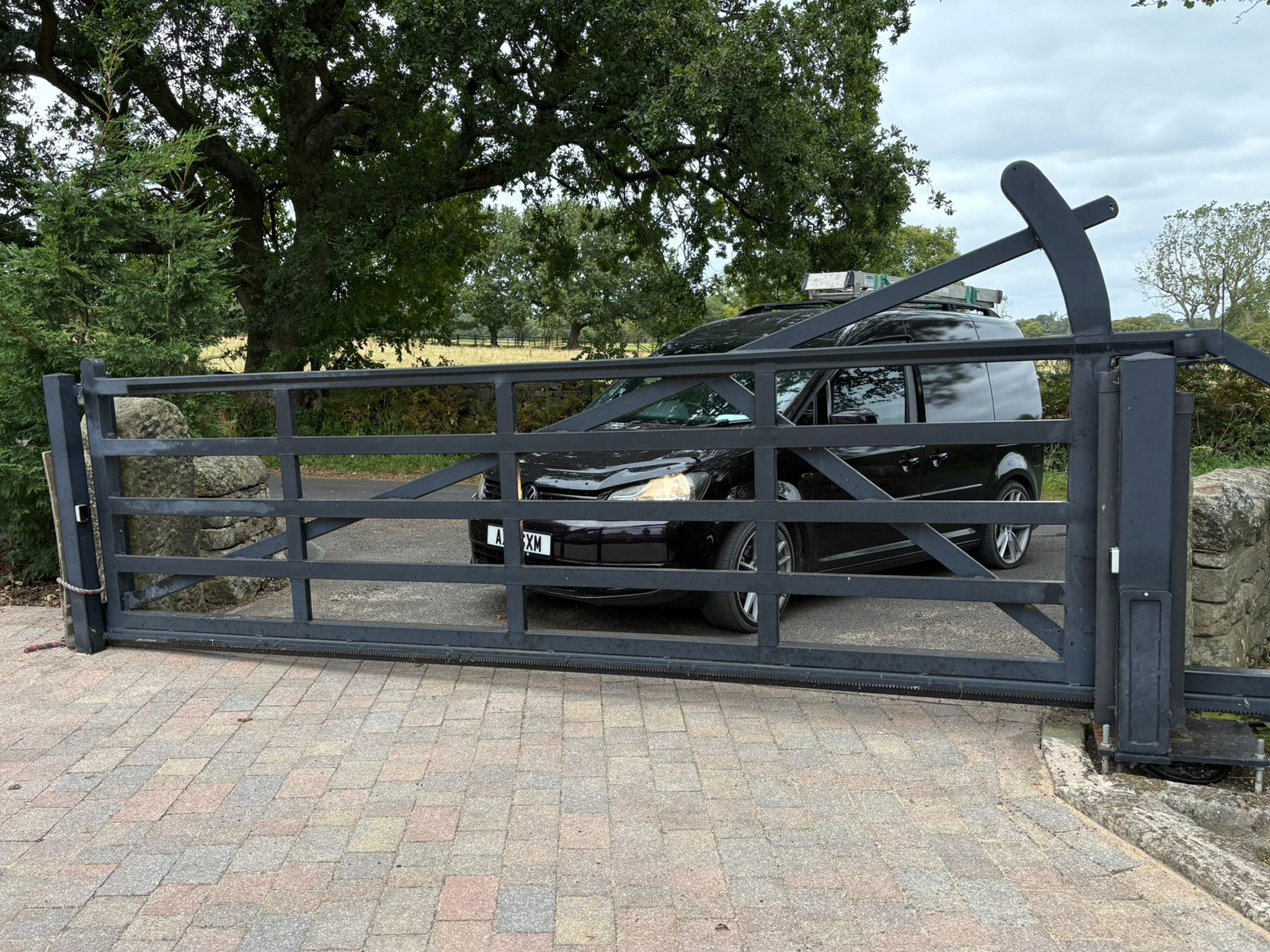 This image shows a large farm-style automated gate.