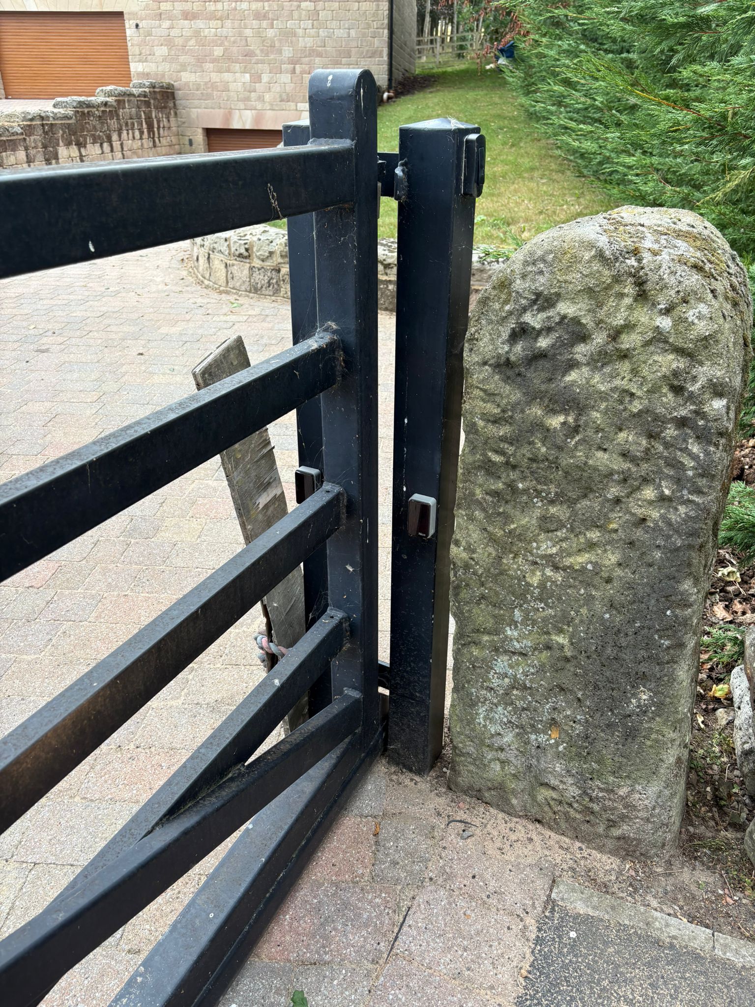 This image shows a large farm-style automated gate.
