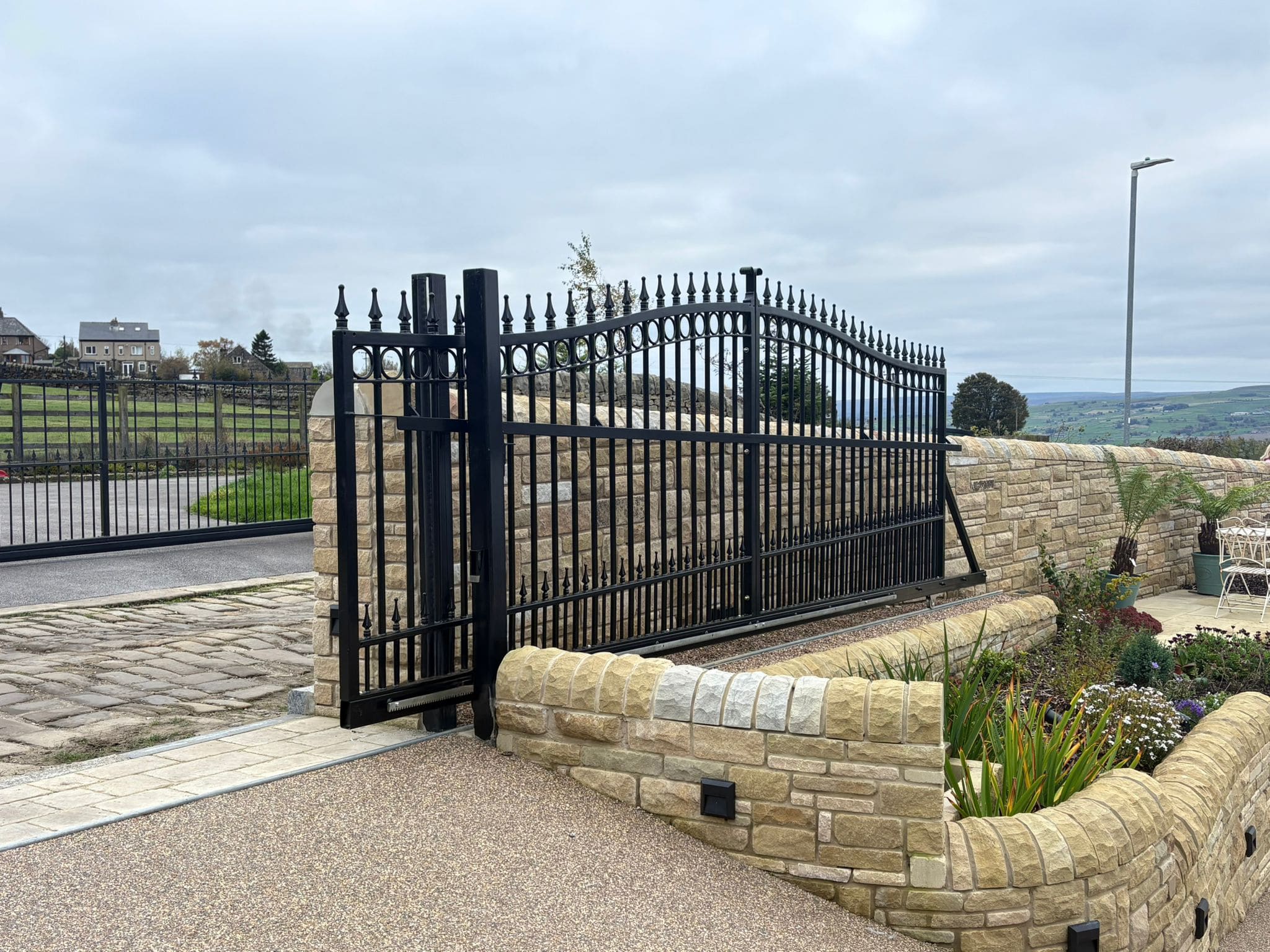 This image shows an automated sliding gate.