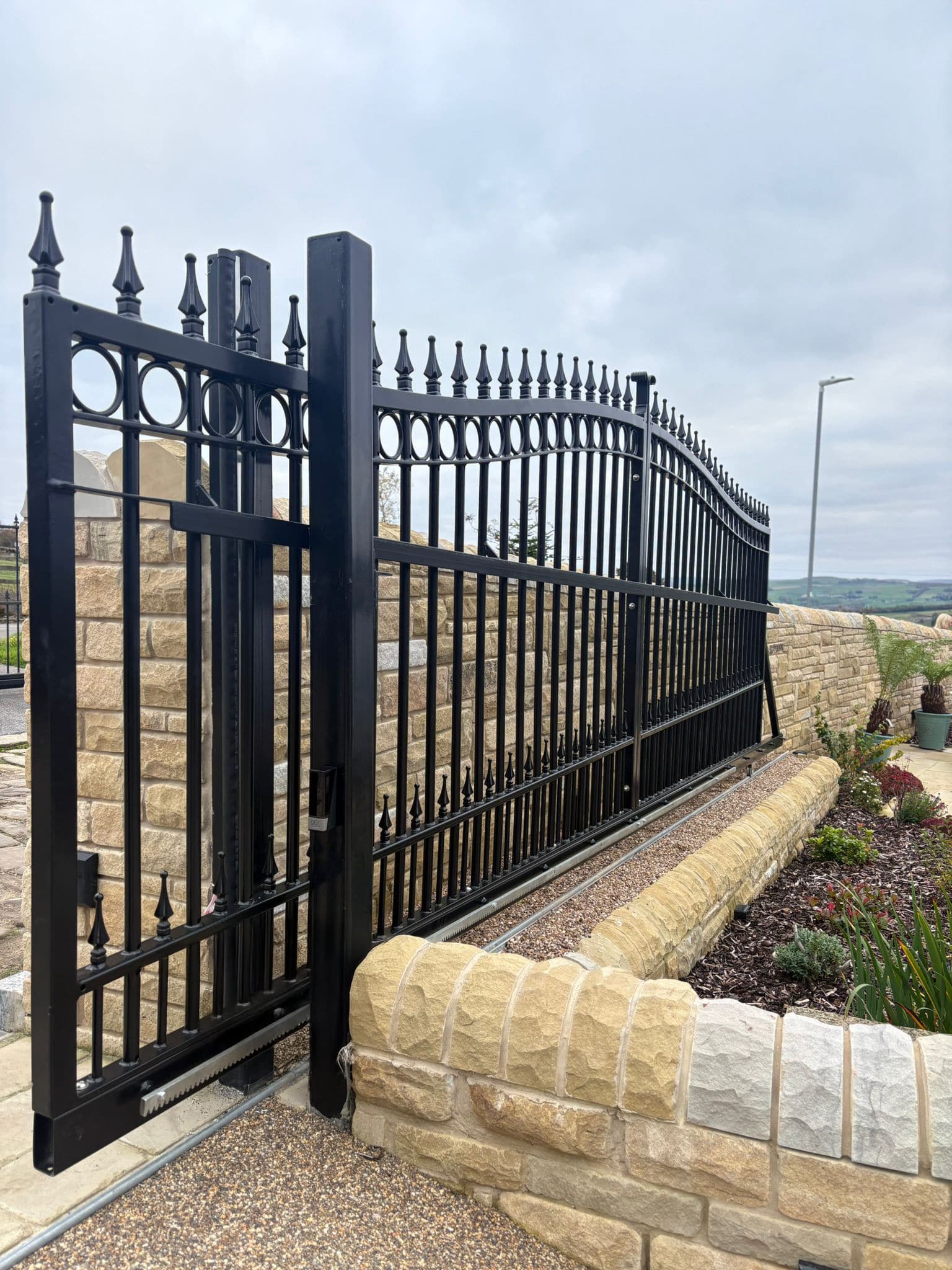This image shows an automated sliding gate.