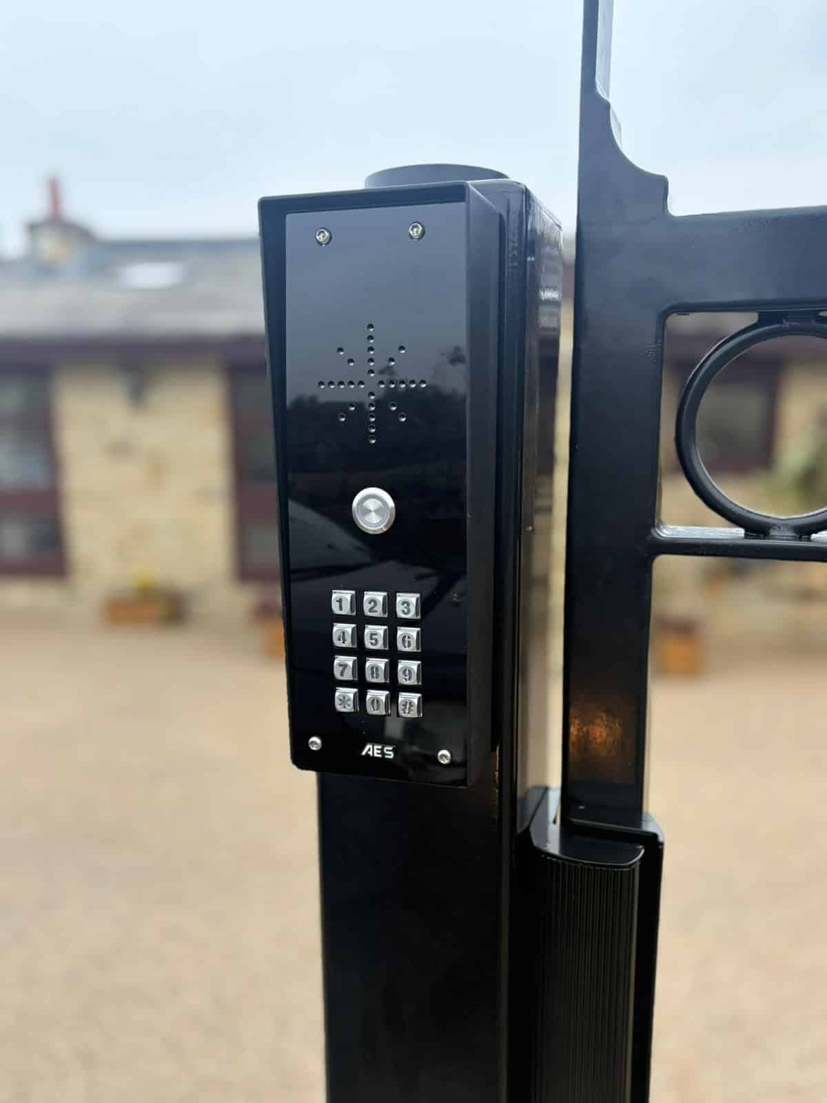 This image shows an AES GSM/4G Intercom with keypad.