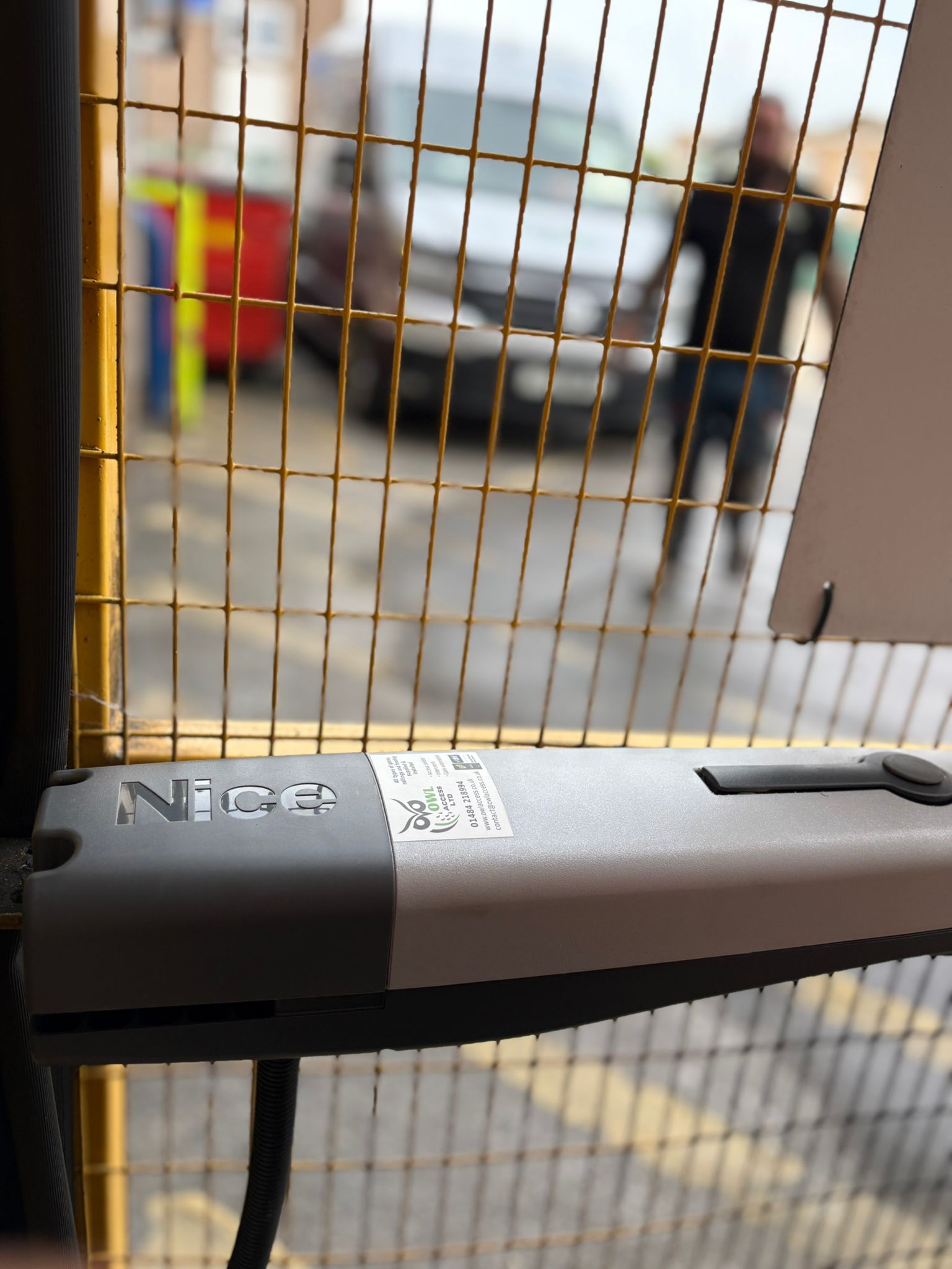 This image shows an automated gate with a Nice Hi-Speed system.