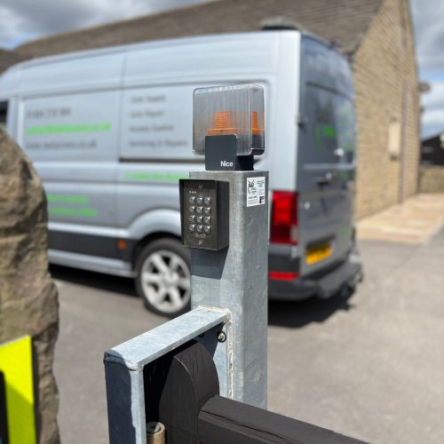 This image shows an SRS keypad, on a DEA automated gate system, and a Nice Strobe Light. Gate Automation Upgrade with Exit Keypad Access